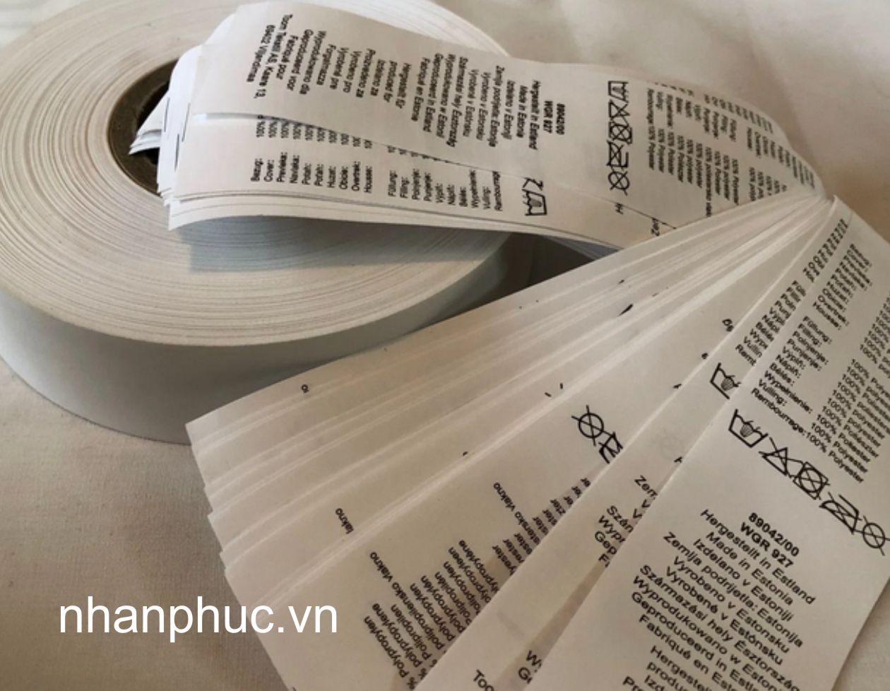 Tag mác quần áo vải nylon Nhân Phúc in giá rẻ ở tại Hà Nội